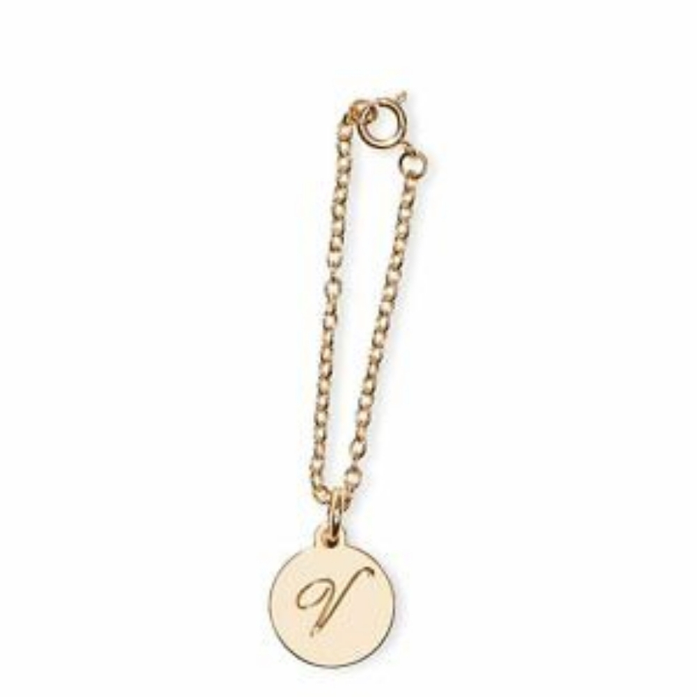 Nip luxury VS v in circle gold tone pendant with chain bottle charm.
